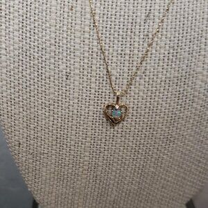 10K Yellow Gold Opal Diamond Pendant Chain is 14K Yellow Gold 16"